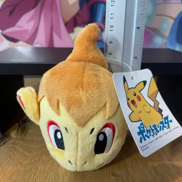 Pokémon – Peluche – Pochette Ouisticram Chimchar Face Pouch 10 cm